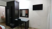 Suite con zona de cocina y sala de estar 