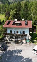 Tattoo PENSION mit Restaurant und Tattoo-Studio - Ferienwohnung Mörtschach