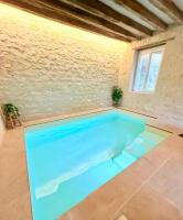 Suite romantique, piscine intérieure privée et sauna - Ferienwohnung Châteauvieux