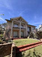 Casa luminosa con amplio jardín en Barrio Golf - Ferienwohnung Tandil