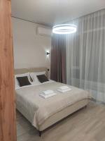 ЖК Evolution рядом с ТРЦ Хан Шатыр - Ferienwohnung Astana