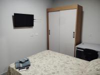Apartamento compacto de 1 quarto com suíte - Chambres d'hôtes Maringá
