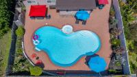 The Splash Society-Pool, Spa, Games, and Vibes - B&B Oceanside