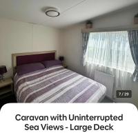 Caravan with Uninterrupted Sea Views - Large Deck - Havens Quay West New Quay West Wales - Chambres d'hôtes New Quay