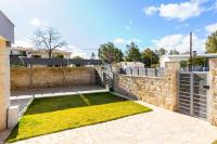 AG Stone Home - Idyllic Beachside Villa in Isthmia - B&B Isthmía