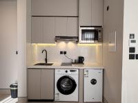 Amara BLVD 1BR Balcony BLVD view - B&B Riyad