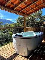 Chalé Aconchego da Lapinha Vista para Montanhas Piscina e Natureza - Chambres d'hôtes Santana do Riacho