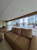 Cozy 1BR UResidence 2 by REJA Essentials - B&B Kelapadua