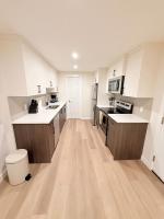 Modern Seton Suite Kitchen Laundry TV - B&B Calgary