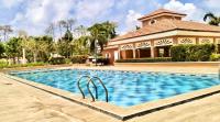 IXA Camella Gated Townhouse Fast Wifi Pool & 10 mins airport - Chambres d'hôtes Puerto Princesa