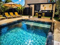 Villa des palmiers - Magnifique villa avec piscine chauffée et terrain de pétanque - Chambres d'hôtes Bon-Encontre