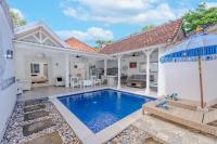Peacock Bungalow by Pertama Stay - B&B Seminyak