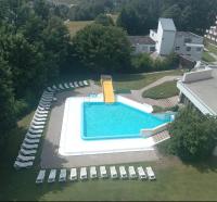 Ferienwohnung Harmonia inklusive Hallenbad, Außenpool, Sauna & Fitnessstudio, familienfreundlich ausgestattet, großes 2-Zimmer-Apartment - Chambres d'hôtes Sankt Englmar