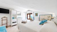 Kamer met Queensize Bed en Uitzicht op Zee