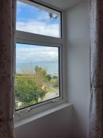 Coastal cottage in seaside village - Pass the Keys - B&B Moelfre