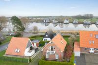 Ferienhaus Strandperle - Ferienwohnung Harlesiel