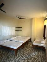 Lit Simple dans Dortoir Mixte