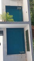 Apartamento moderno, a 200 metros da praia com pátio,piscina e churrasqueira privativa 2 vagas de garagem - Chambres d'hôtes Porto Belo