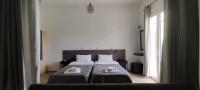 Grote Kamer met 2 Bedden