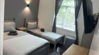 Chambre Triple avec Salle de Bains Privative