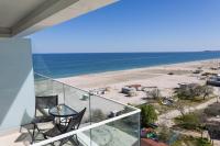 One-Bedroom Apartment with Balcony and Sea View
