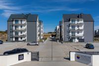 Klimatyzowany Apartament z Balkonem i Parkingiem by Noclegi Renters - B&B Ustronie Morskie