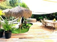 Maison ambiance cabane exotique climatisée piscine & spa 3 chambres 6 personnes - Chambres d'hôtes Messanges