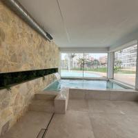 Area Beach apartment with Lots of Extras - Chambres d'hôtes Guardamar del Segura
