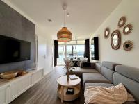 Ferienwohnung "Strandbutze 203" Heiligenhafen direkt am Meer – Seeblick, Südbalkon, 4 Personen - Ferienwohnung Heiligenhafen
