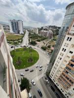 Modern penthouse front beach and restaurants - B&B Tangeri