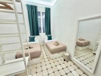 Tweepersoonskamer met 1 of 2 Bedden en Gedeelde Badkamer