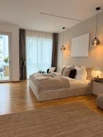 Große Designwohnung in Friedrichshafen mit Café im Haus und nur 5 Min zum Bahnhof, Bodensee, Messe & Flughafen - Chambres d'hôtes Friedrichshafen