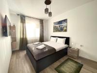 Pet Friendly Arghezi Apartment - Chambres d'hôtes Braşov