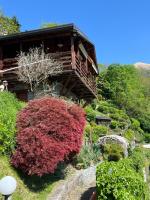 Chalet con piscina riscaldata e sauna privata vicino al Lago Orta - Bed and Breakfast Strona