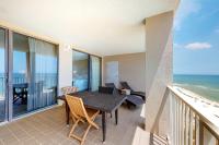 Large beachfront condo with views from private balcony and shared hot tub & pool - Ferienwohnung Orange Beach
