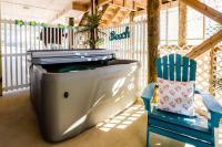 Easy beach access dog-friendly island home with private hot tub & shared pool - B&B Dauphin Island