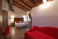 Habitación Cuádruple amplia con balcón