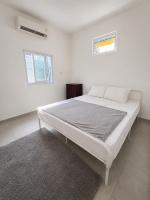 Guesthouse walking distance to Beach with share kitchen - Ferienwohnung Jimbaran