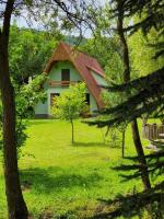 Csendliget kulcsosház - B&B Sub Cetate