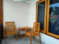 Tweepersoonskamer met 2 Aparte Bedden en een Terras