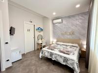Chambre Double avec Balcon (2 Adultes + 1 Enfant)