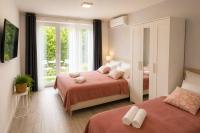 Deluxe Two-Bedroom Apartment with Garden View