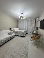 Novo, studio em frente à Praia do Gonzaga - Bed and Breakfast Santos
