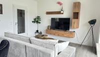 10 min von Legoland entfernter Familienhaus, Moderne ca 100m2 große Wohnung mit Whirlpool, NETFLIX, WLAN, großer Garten, fürs erste Frühstück gefüllter Kühlschrank, wunderschöne Terrasse, privater Parkplatz My Luxury Apartments - Chambres d'hôtes Guntzbourg