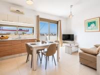 One-Bedroom Apartment with Balcony and City View