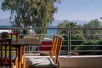 Aphrodite Residence - Seafront apartment, Melissi - Chambres d'hôtes Melíssi