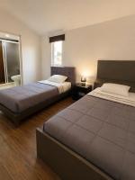 Tweepersoonskamer met 2 Aparte Bedden en een Extra Bed