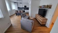 One-Bedroom Apartment with Balcony and City View