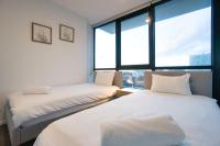 Bright and Modern 2BR Apt with Pool and Wellness Facilities - Chambres d'hôtes Adélaïde