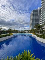 Beach Resort Condo Wave Pool Fast Wifi and PS5 - B&B San Fernando